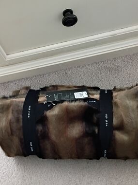West Elm Plush Faux Fur Throw in Mixed Brown Tones